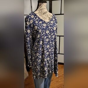 Very artsy blouse with cutouts and lace accents. Size Large.